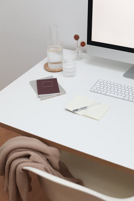 Home office workspace with exercise equipment