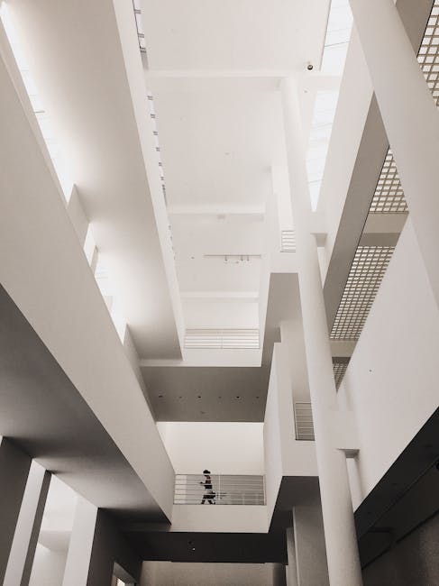 Modern office building with people walking